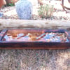 Bird Spa made from 80 year old joist