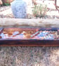Bird Spa made from 80 year old joist