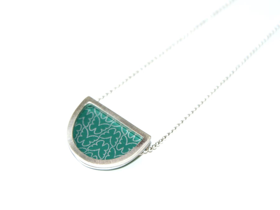 Silver and teal semi circle necklace - butterfly pattern