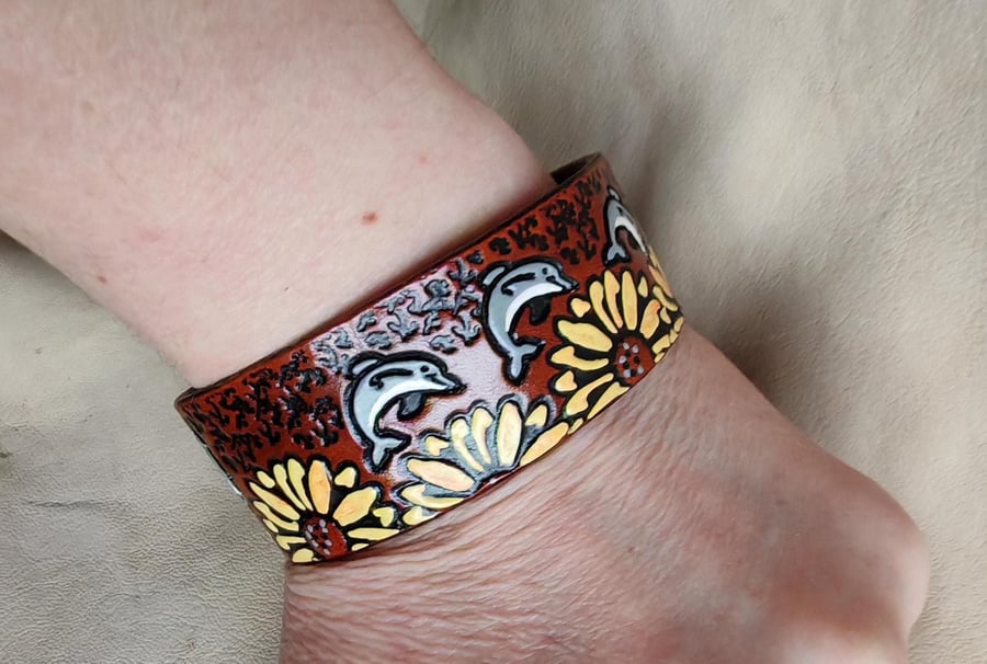 Handmade Leather Bracelet with a Surreal Design. Dolphins and Sunflowers