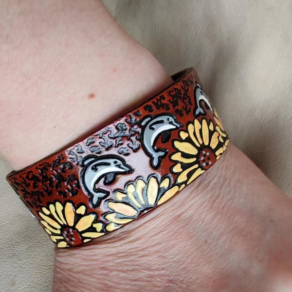 Handmade Leather Bracelet with a Surreal Design. Dolphins and Sunflowers