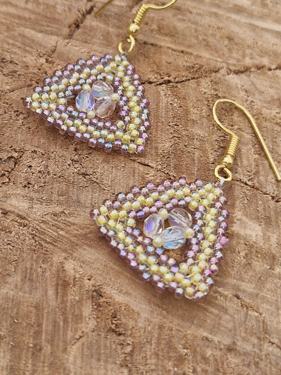 Pale yellow and shimmering pink gem triangular geometric earrings