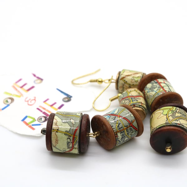 Long earrings of graded size paper beads made of an old map of Greater London