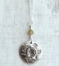 Sterling silver botanical pendant with daffodil and tourmaline. - Image 5