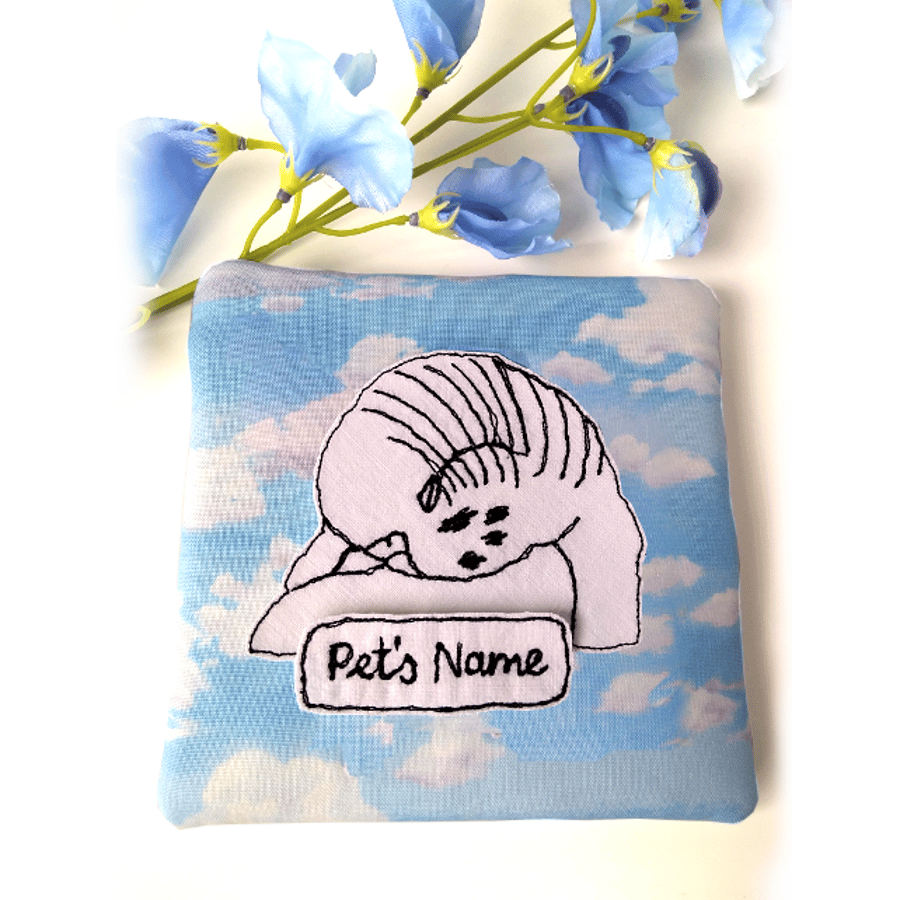 Small pet memorial pouch – Sleeping bird image against blue sky