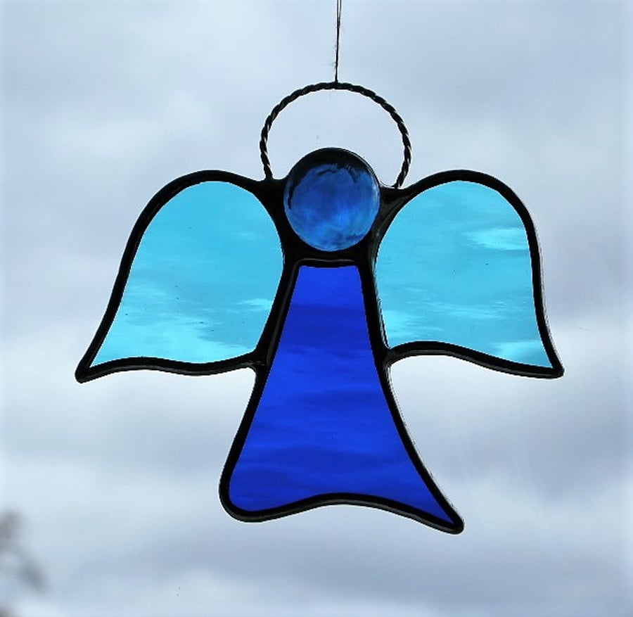 Stained glass suncatcher (Angel) abstract in sky blue and cobalt blue waterglass