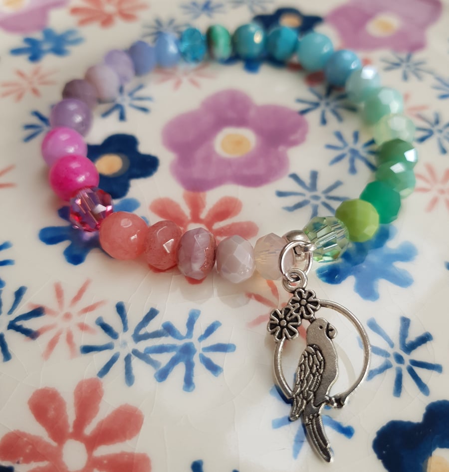 Elasticated Bracelet - Rainbow Mixed Bead With Parrot Charm