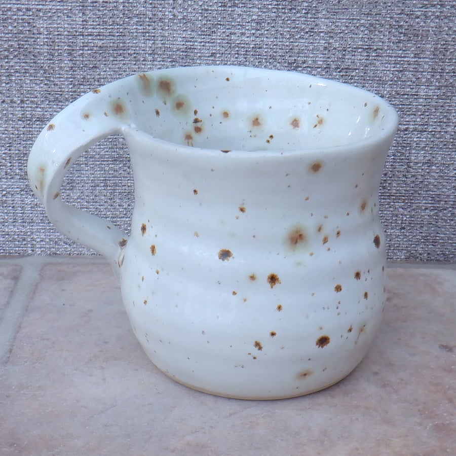 Left handed coffee mug tea cup in stoneware hand thrown ceramic pottery
