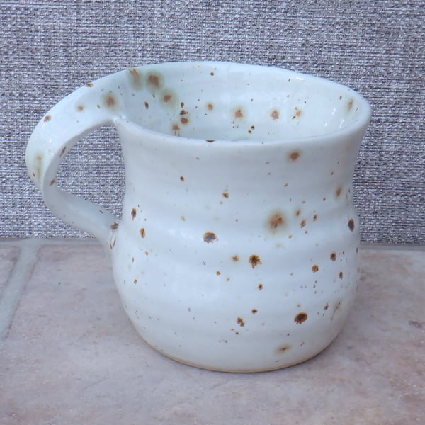 Left handed coffee mug tea cup in stoneware hand thrown ceramic pottery