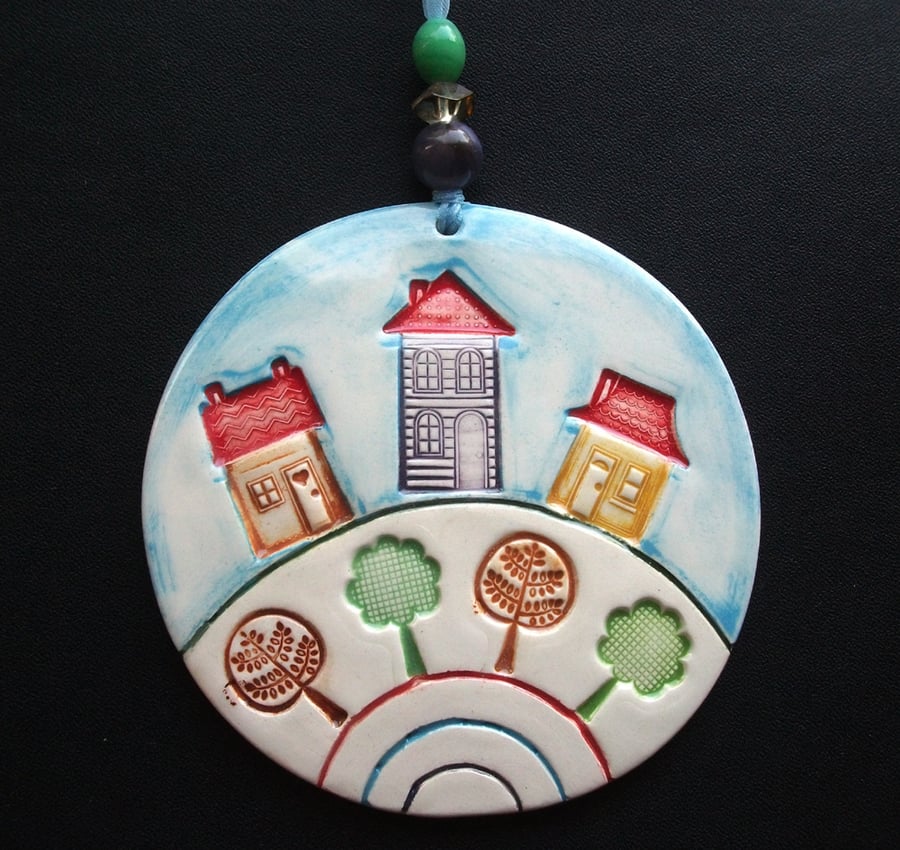 Ceramic plaque - houses on a hill