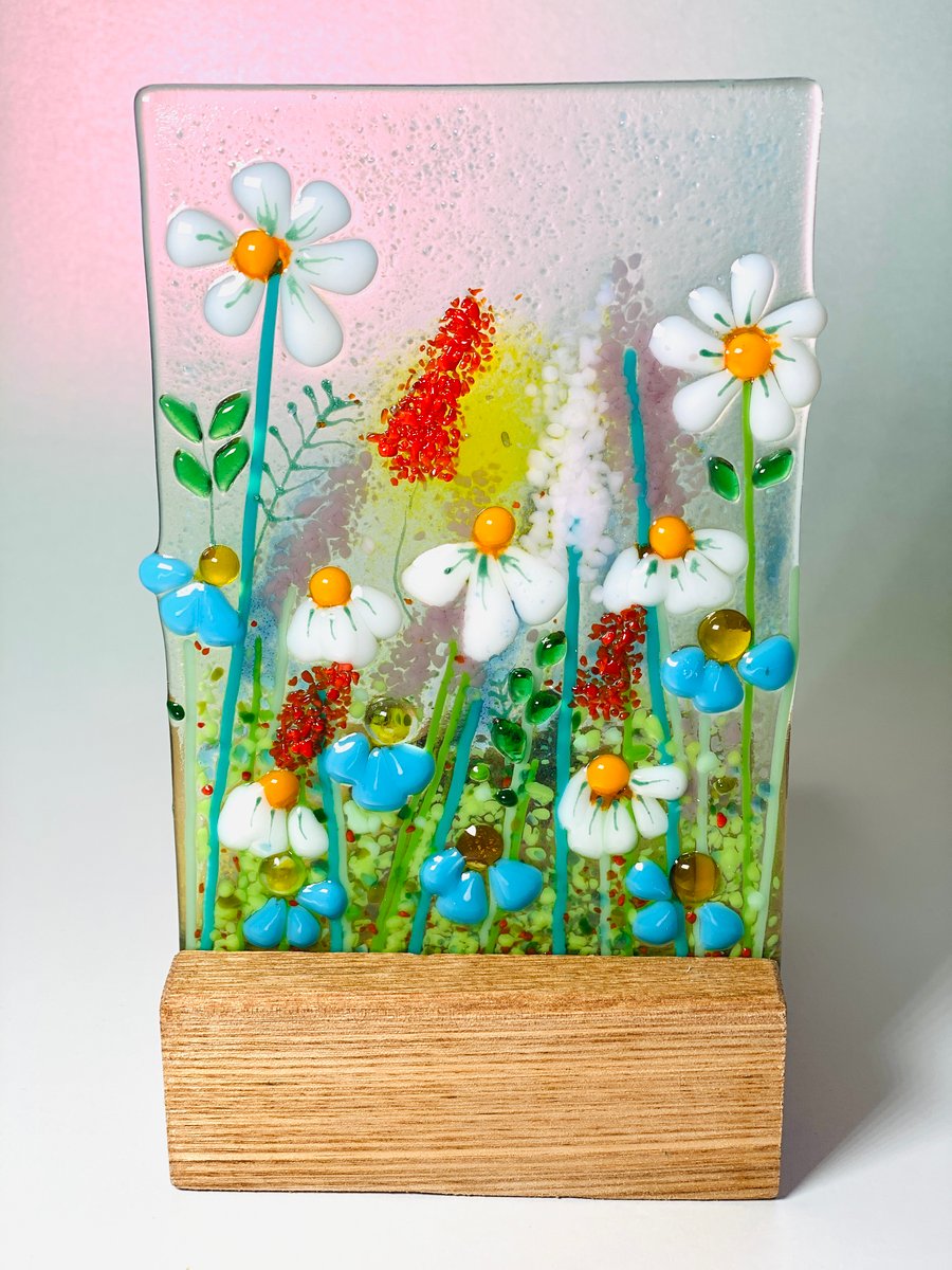Floral fused glass meadow panel in an oak candle base 