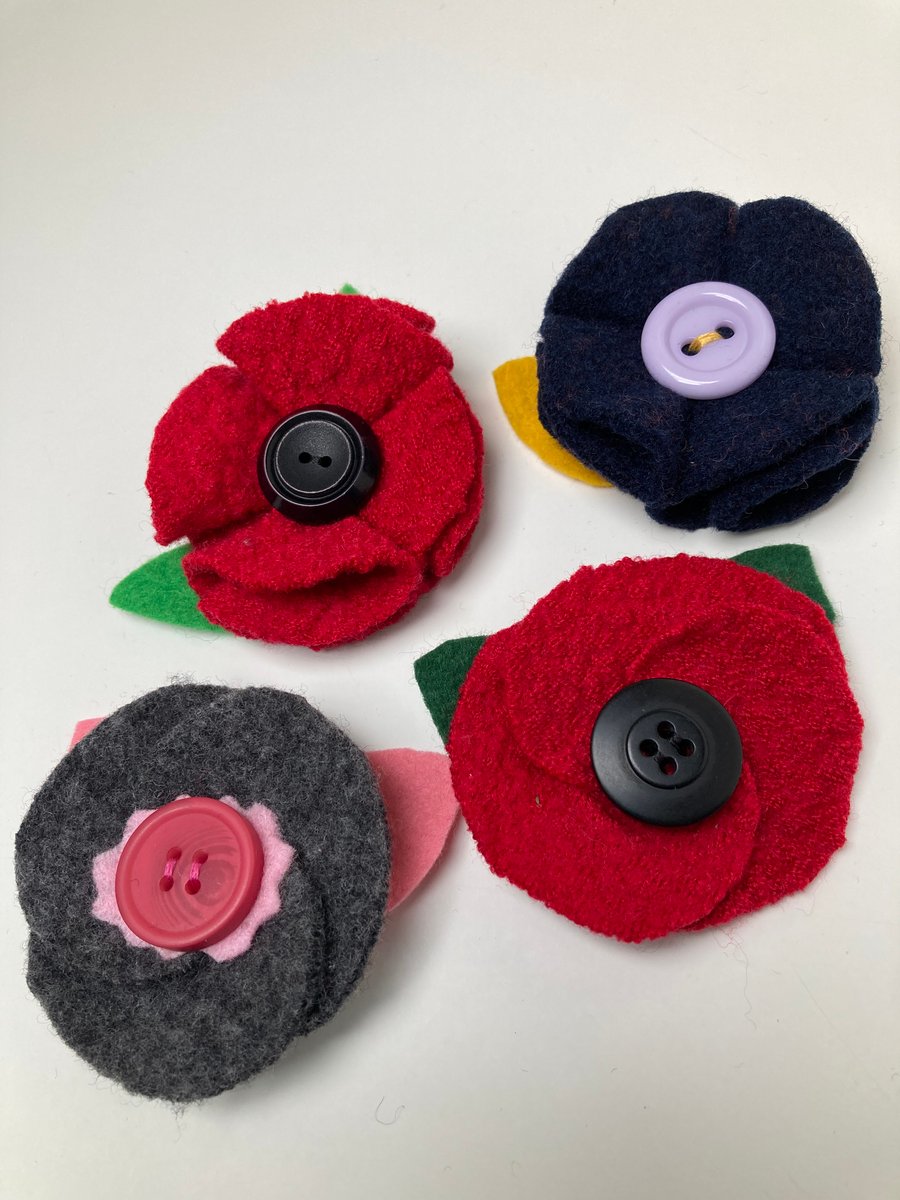 Poppy brooches made from recycled wool.