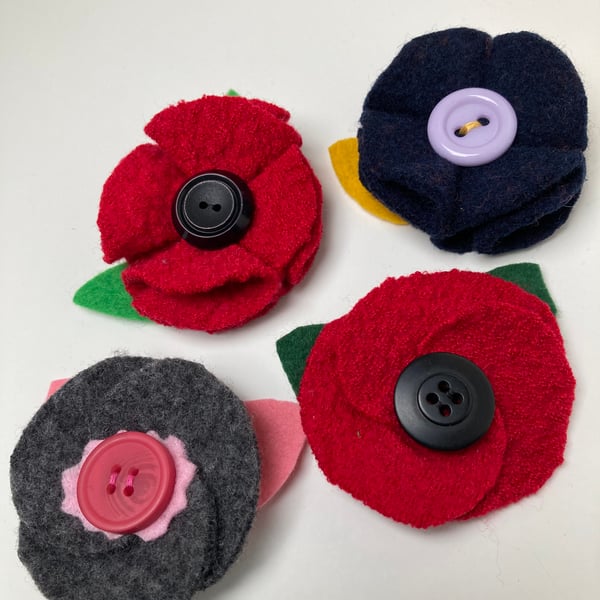 Poppy brooches made from recycled wool.