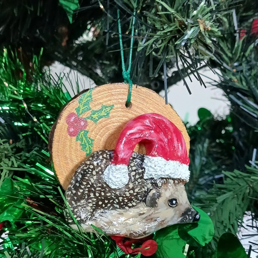 Christmas tree decoration, Hedgehog with a santa hat made from air dry clay.  