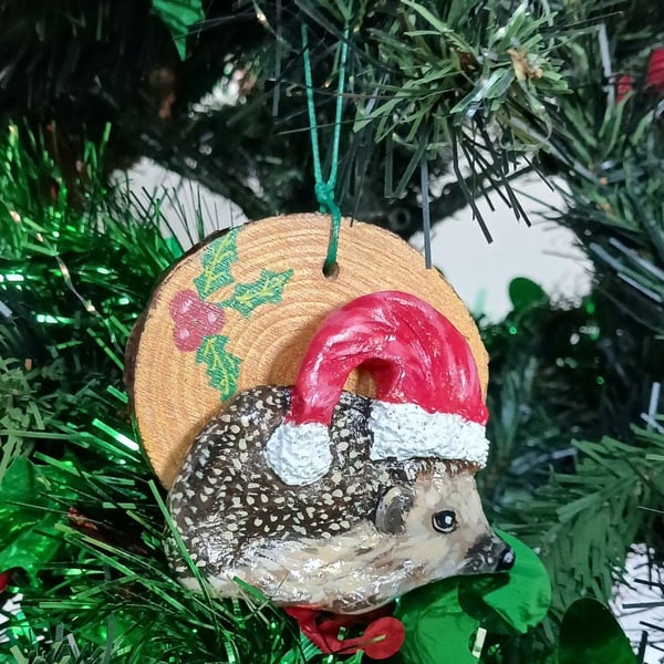 Christmas tree decoration, Hedgehog with a santa hat made from air dry clay.  