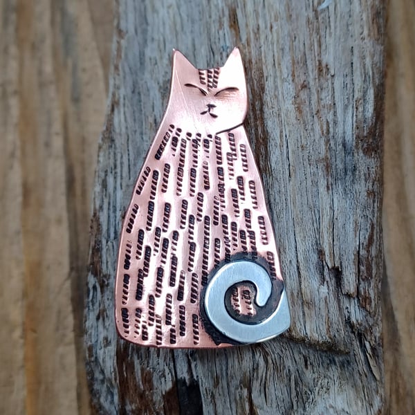 Copper cat brooch with silver tail 