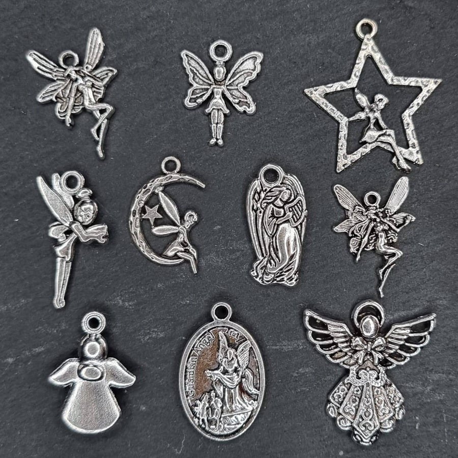 10 Antiqued silver tone fairy theme charms