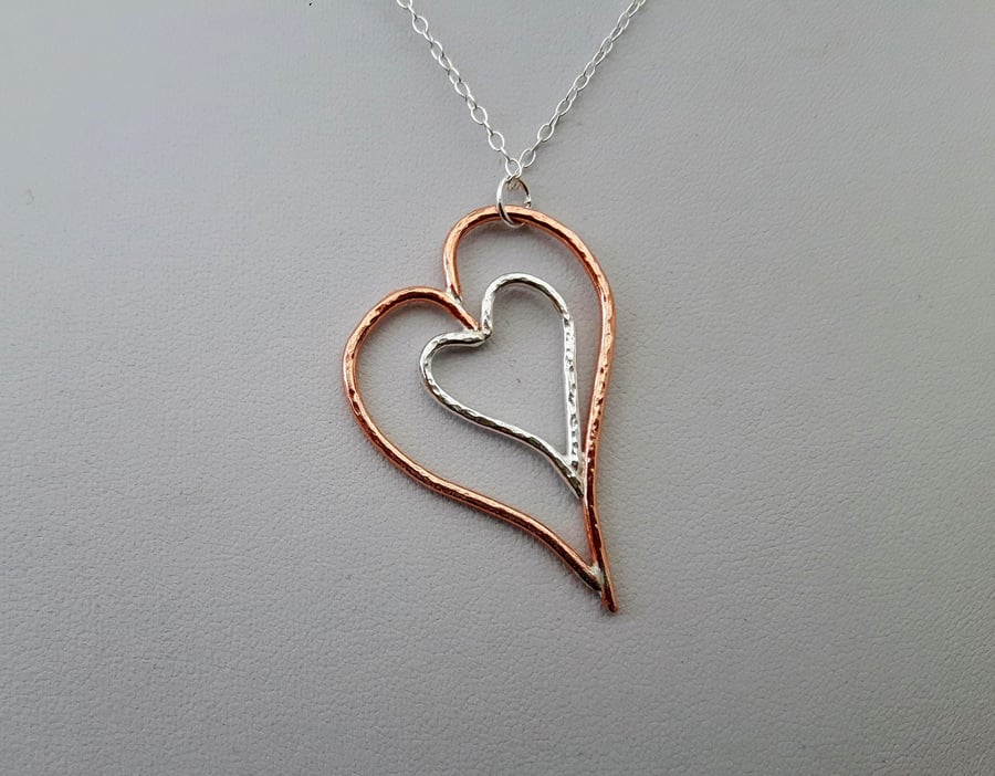 Nested Hearts Pendant in Sterling Silver and Copper 