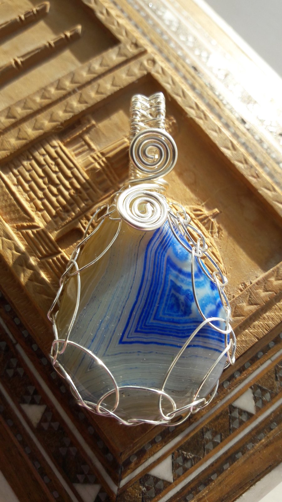 Blue and White Onyz Teardrop Wire Wrapped Pendant