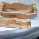 Curved flamed beech storage box