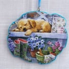 Sleeping dog decoupaged log slice wall hanging