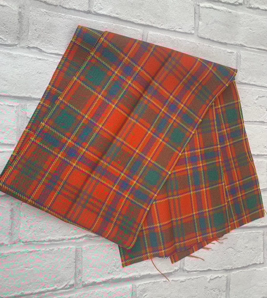 Orange tartan fabric offcut