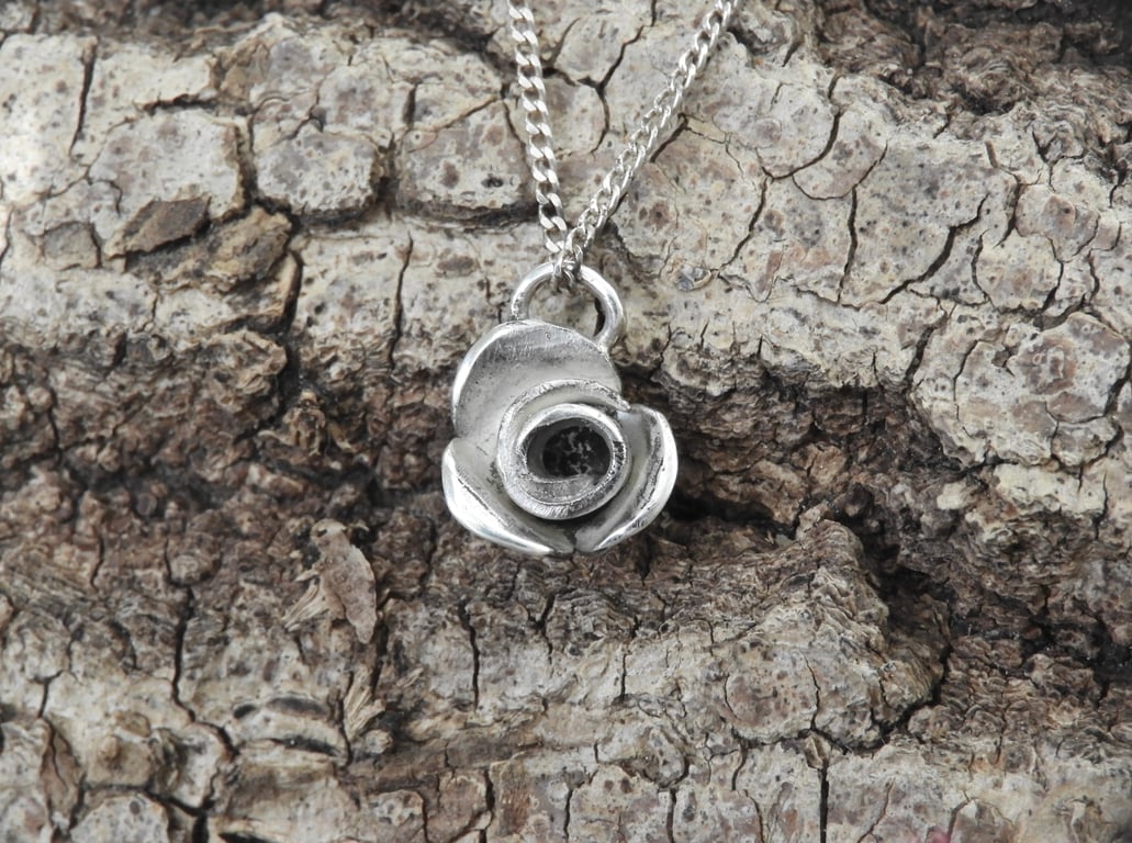 Delicate sterling silver rose pendant