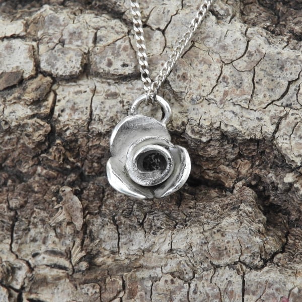 Delicate sterling silver rose pendant