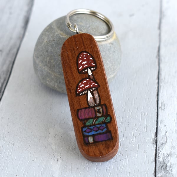 Fungi in the library. Pyrography key ring.