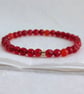 Red-orange faceted agate gemstone stretch bracelet  - Image 9