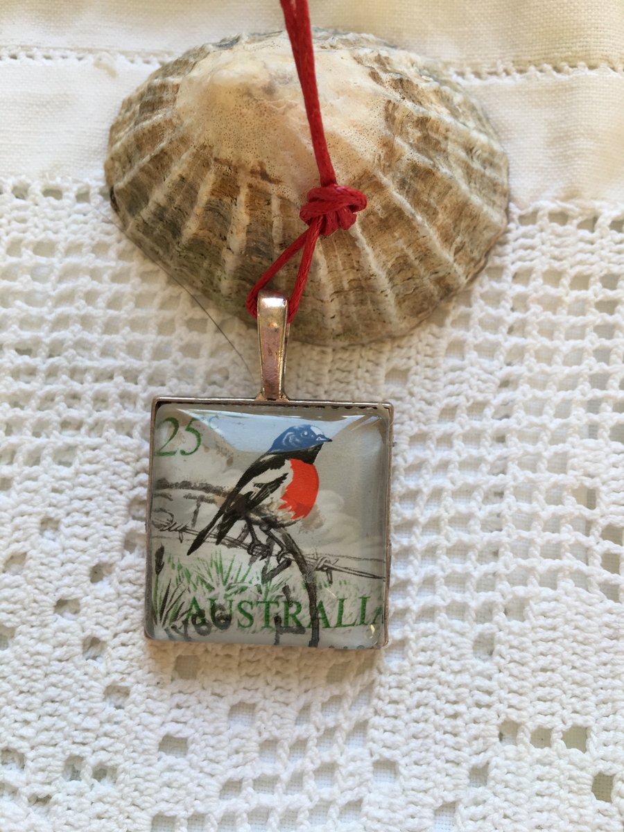Pretty silver coloured pendant Australian scarlet robin bird stamp