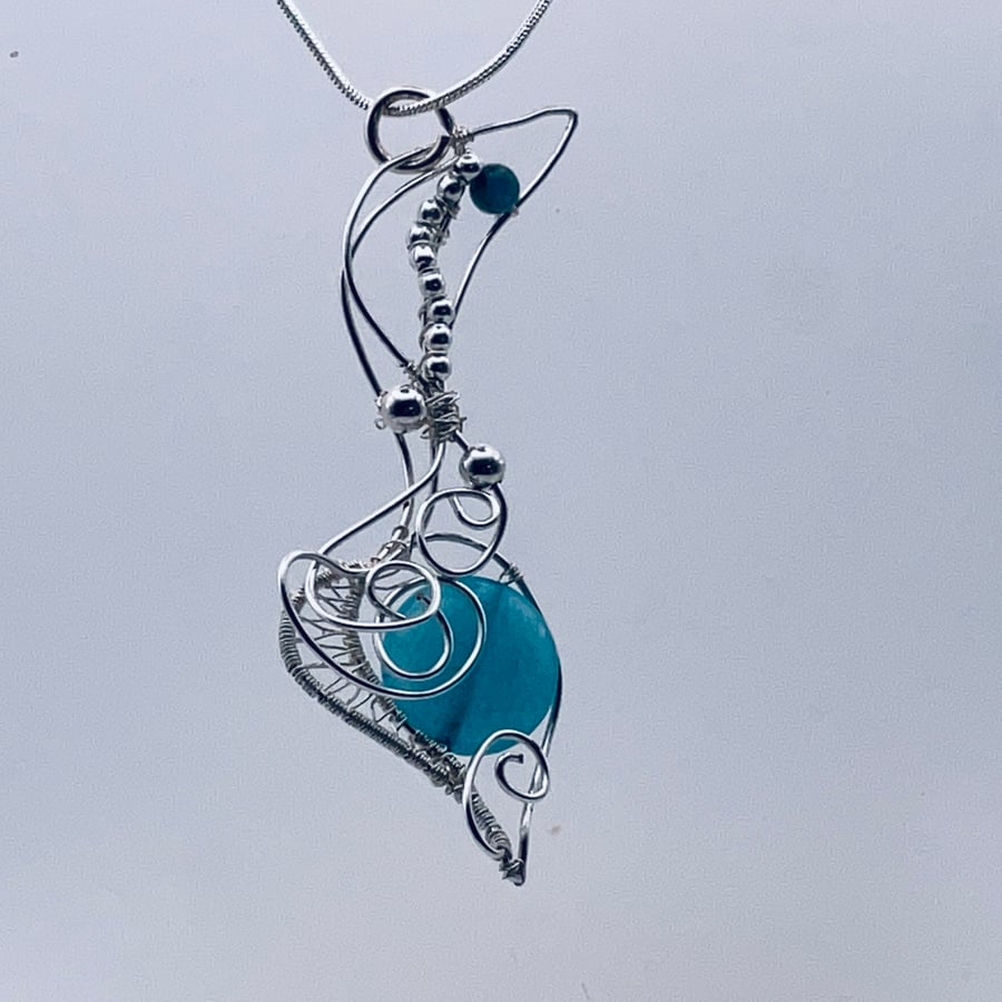 Aqua coloured agate disk wire art pendant