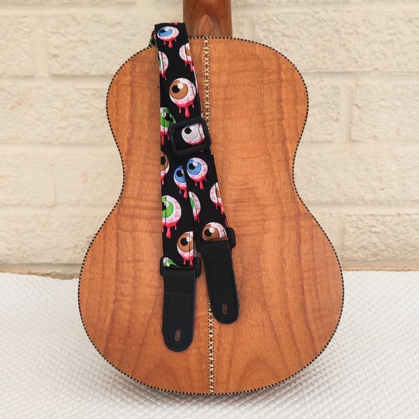 1 inch Wide Adjustable Ukulele Strap with gory eyeballs