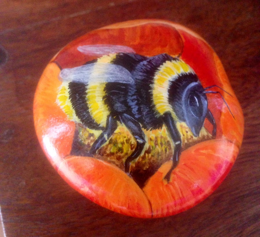 Hand painted rock bumble bee on flower garden or home decor