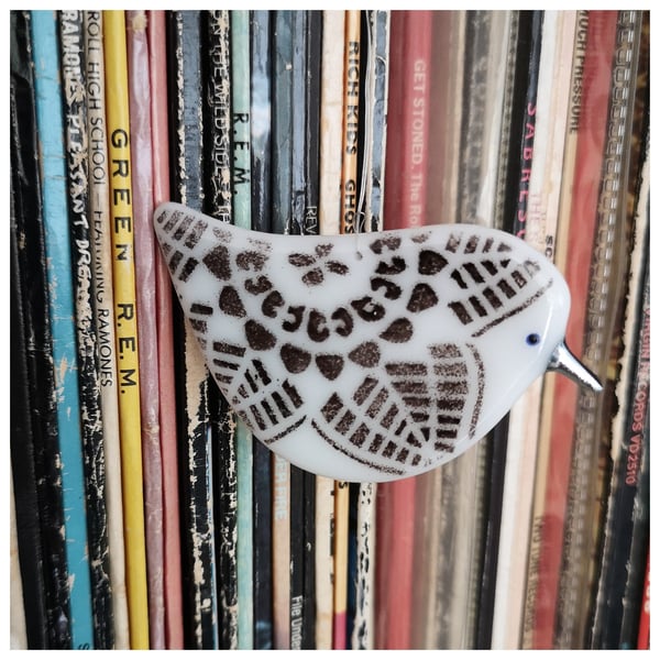 small black and white glass bird