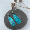 Teal aluminium cow parsley drop earrings with blue bead
