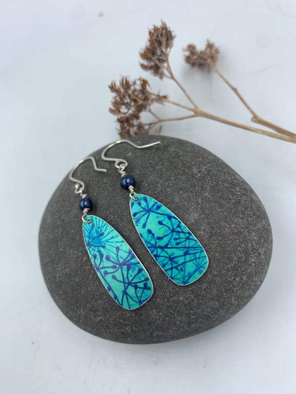 Teal aluminium cow parsley drop earrings with blue bead