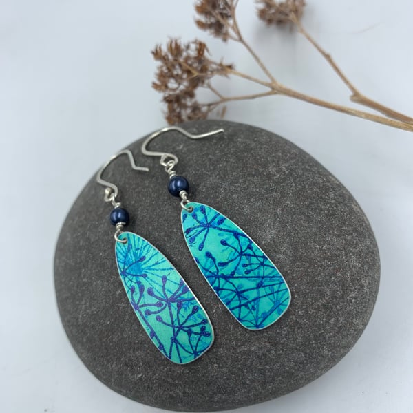 Teal aluminium cow parsley drop earrings with blue bead
