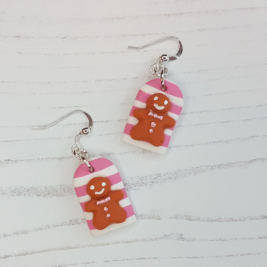 Pink and white striped gingerbread men earrings
