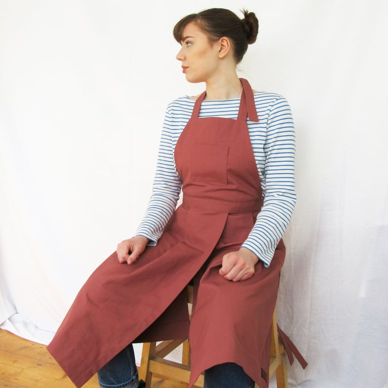 Split Leg Pottery Apron with Pleated Skirt. Soft Red.
