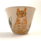 Small cup with dogs and a cat