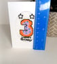 Hand stitched age three birthday card featuring a colourful cross stitch - Image 6