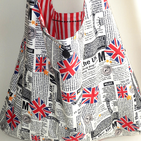 Folding shopping bag in Brit pop, punk, newspaper fabric