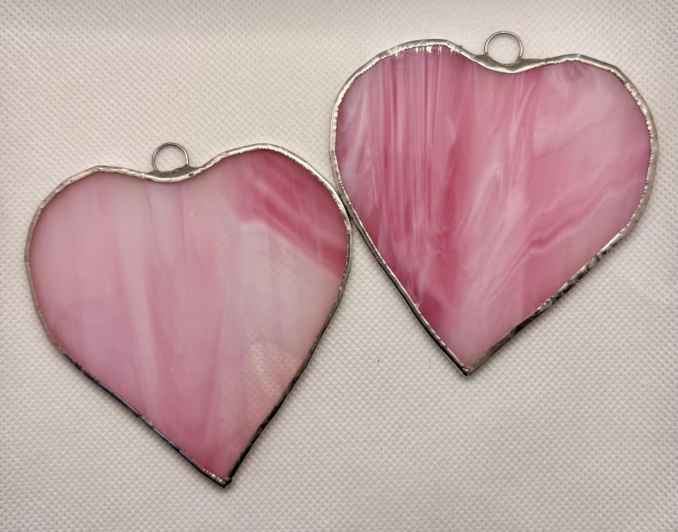 Stained glass pair of hearts in multi-pink glass - very attractive (medium size)