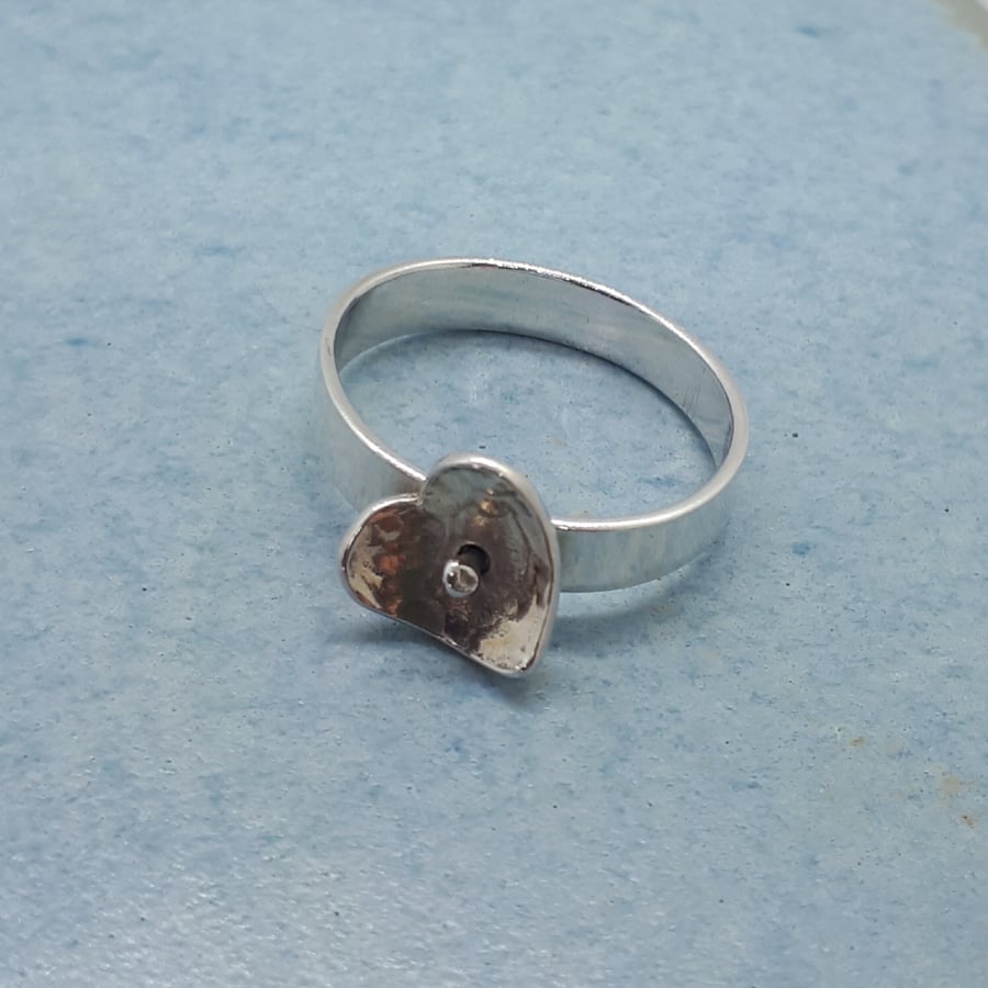 Silver heart spinner ring