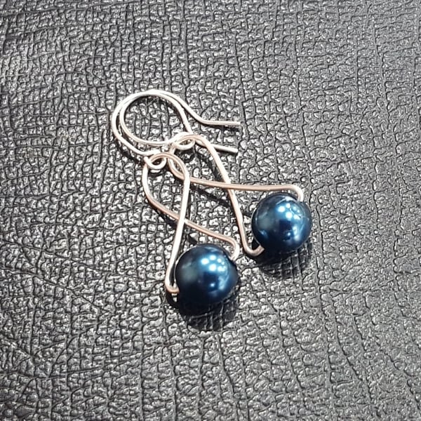 Handmade earrings: Swarovski pearl beads wrapped with sterling silver wire