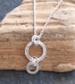 Silver Ring Necklace Pendant, Hammered Silver with Shimmer Texture - Image 4
