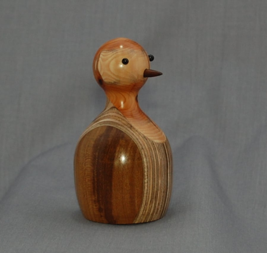 “Happy” A Bird in Assorted Wood