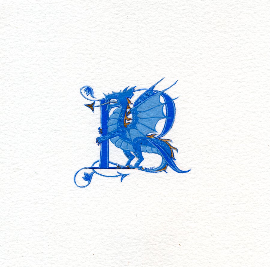 Letter in blue with a blue and gold dragon custom letter.