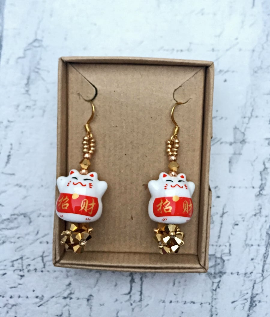 Lucky Cat ceramic dangle earrings with gold bicone beaded beads